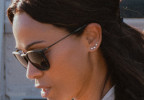 Zoe Saldaña wears black Ray-Ban RB4171 Erika sunglasses in the series Lioness (2024).